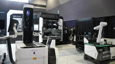 １台のロボでワークもパレットも自動交換／DMG森精機